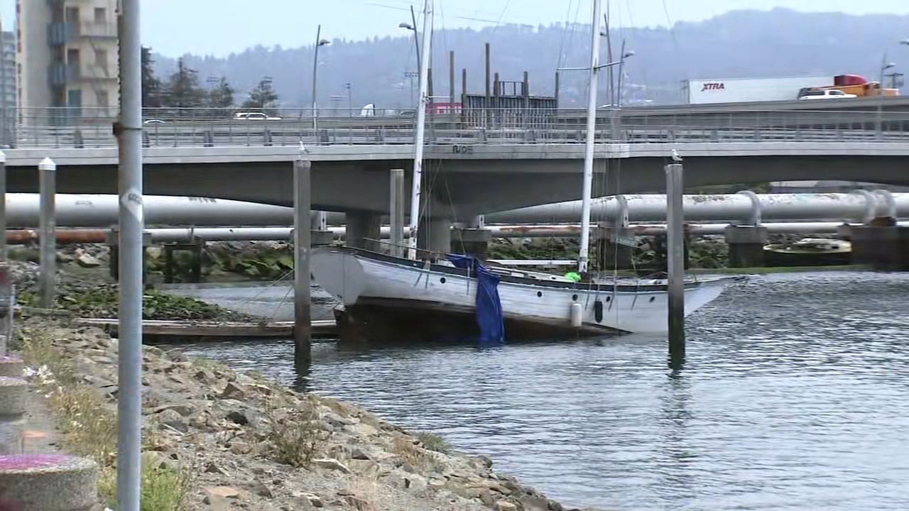 Source-feed image associated with Oakland could soon face fines for illegally docked boats in estuary as efforts to clear it underway
