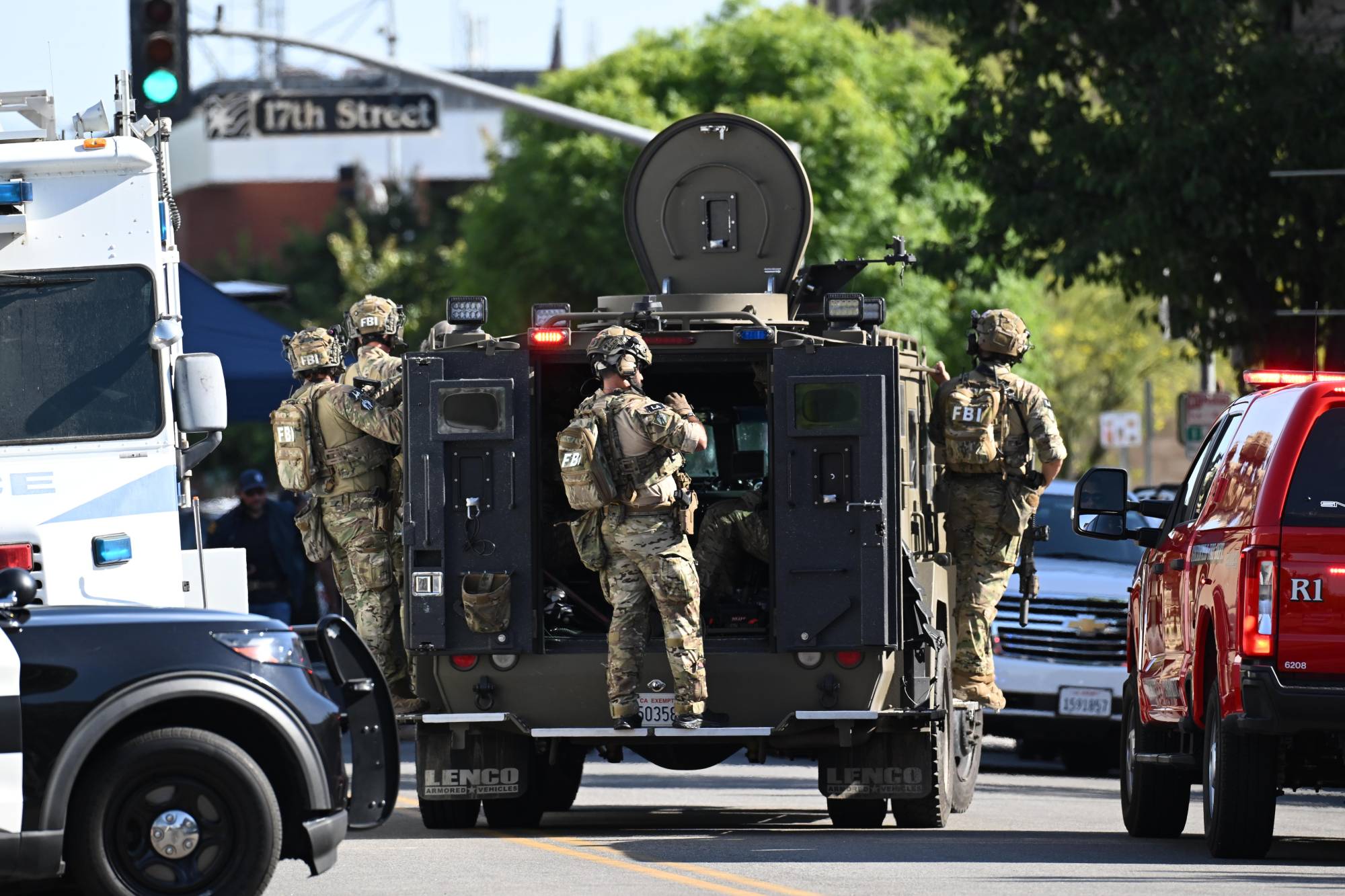 Source-feed image associated with FBI Fatally Shoots a Man Holding Hostages in Bakersfield Office Building, Police Say