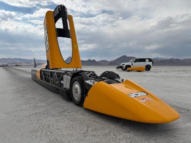 Source-feed image associated with Britain's Andy Green sets another speed record, this time for fastest run in a hydrogen-powered car