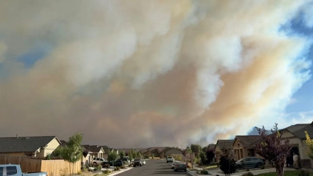 Source-feed image associated with News Wrap: Wildfire forces evacuations near Reno