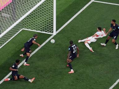 Source-feed image associated with Pochettino annoyed by perceived disappointment after US finishes group play with 3-2 loss to Turkey
