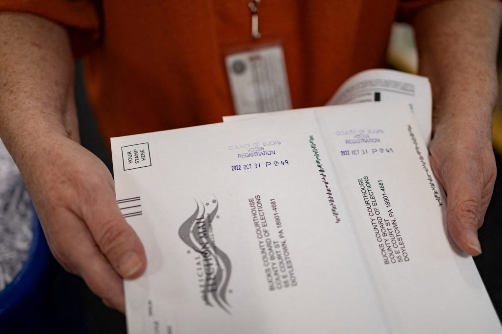 Source-feed image associated with Federal judge refuses to block Trump order to create federal voter list and limit mail voting