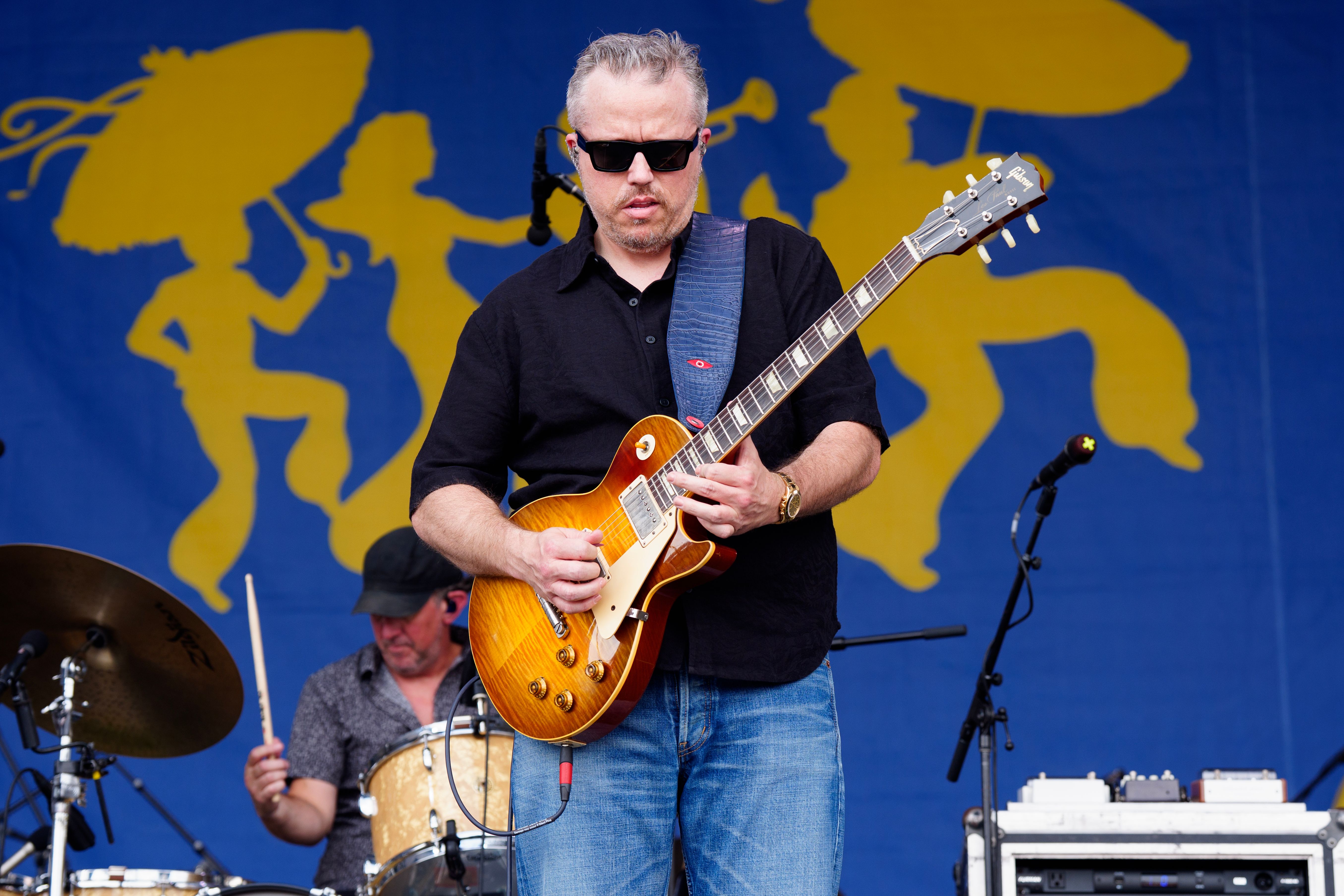 Source-feed image associated with Jason Isbell Sues Suno