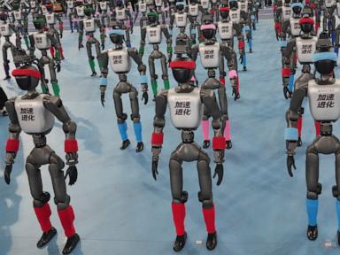 Source-feed image associated with Chinese humanoid robots smash human records in 100m sprint and high jump at Beijing robot games
