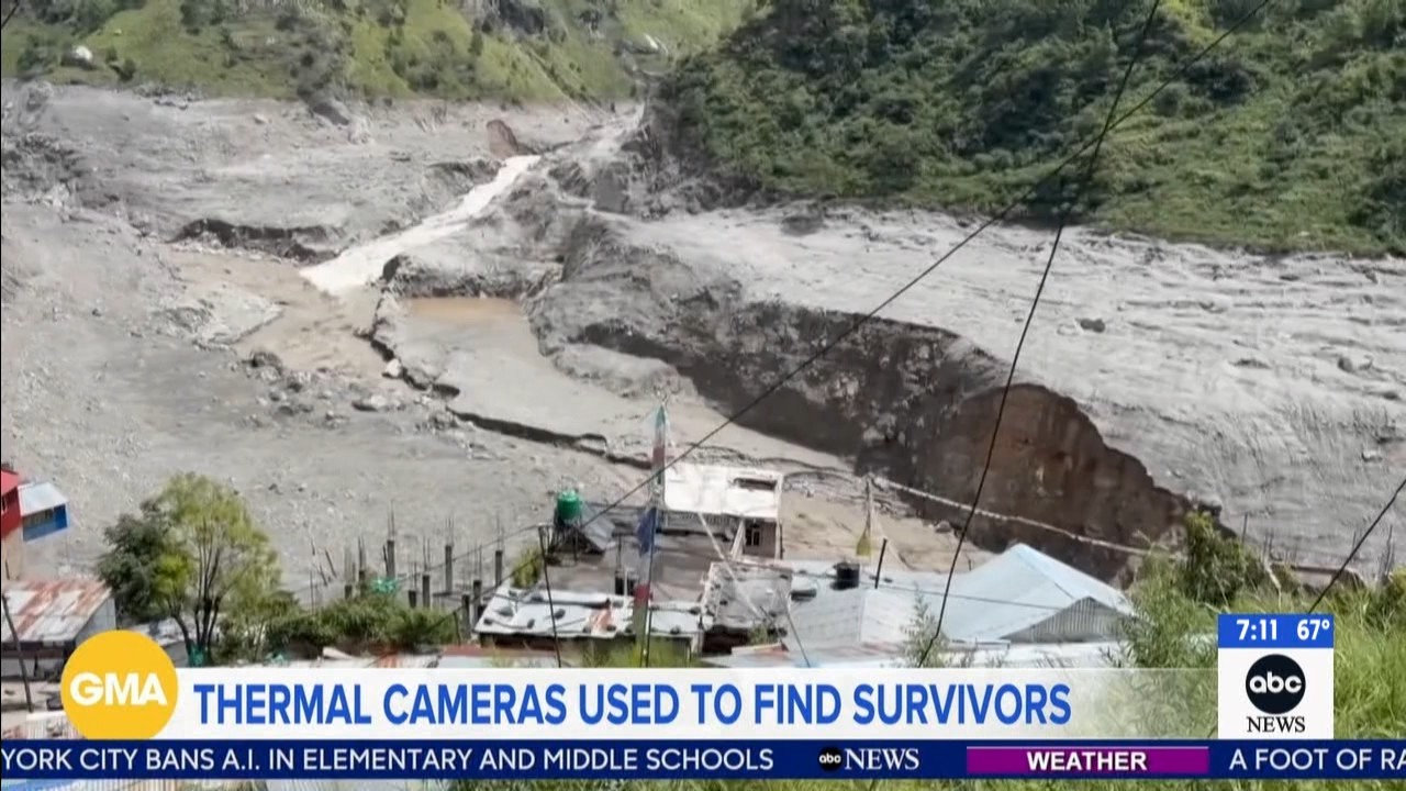 Source-feed image associated with Nepal-Tibet flood death toll tops 1,100 as tens of thousands search for missing