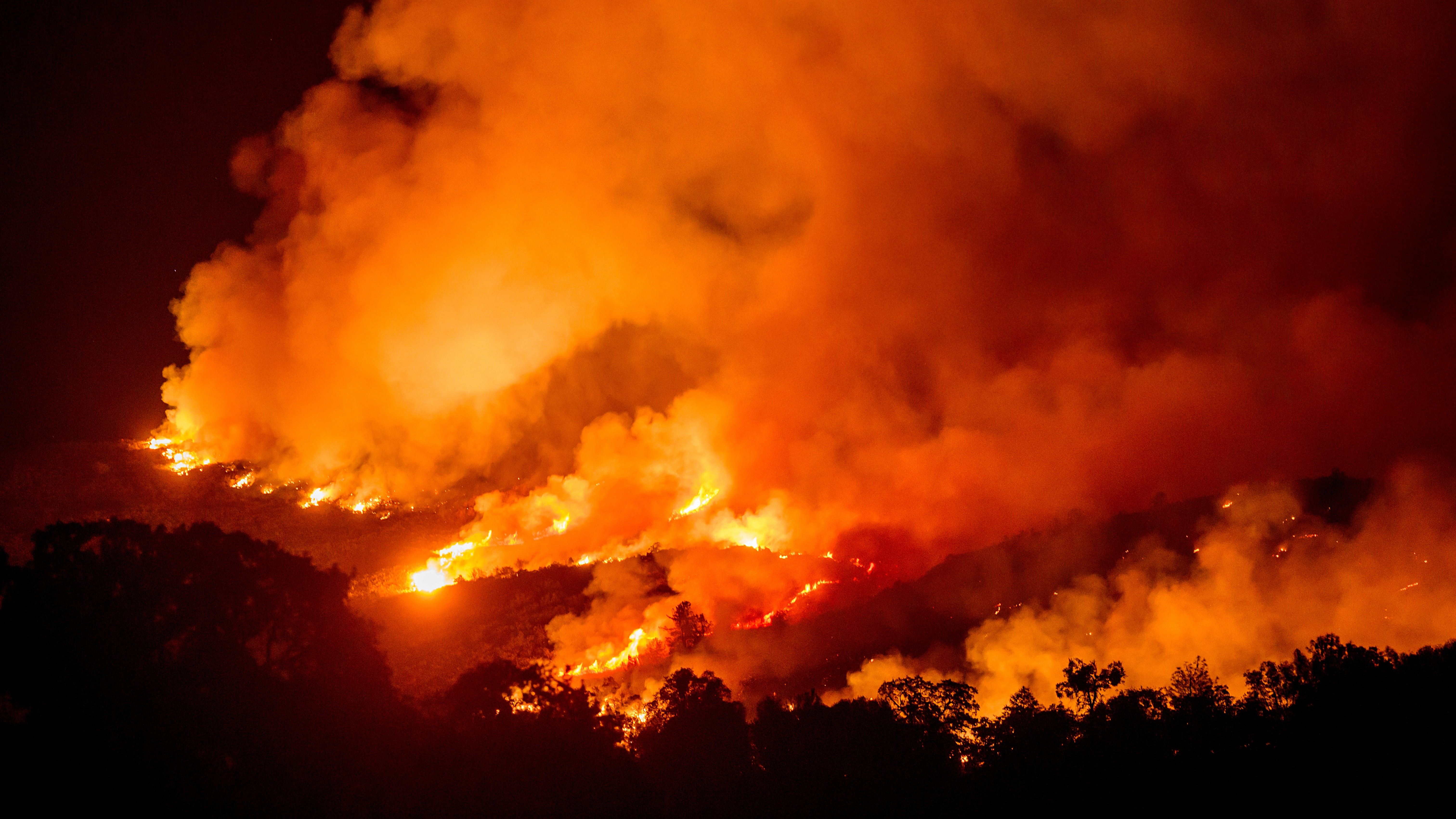 Source-feed image associated with Man arrested on suspicion of starting deadly Gann Fire says it began by accident