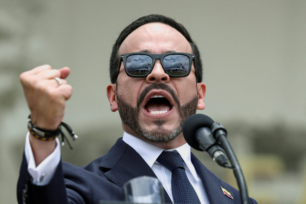 Source-feed image associated with Colombia's president says soldiers killed a key dissident leader