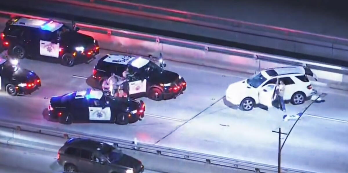 Source-feed image associated with Driver of stolen Mercedes led police on erratic, slow-speed chase through South L.A.