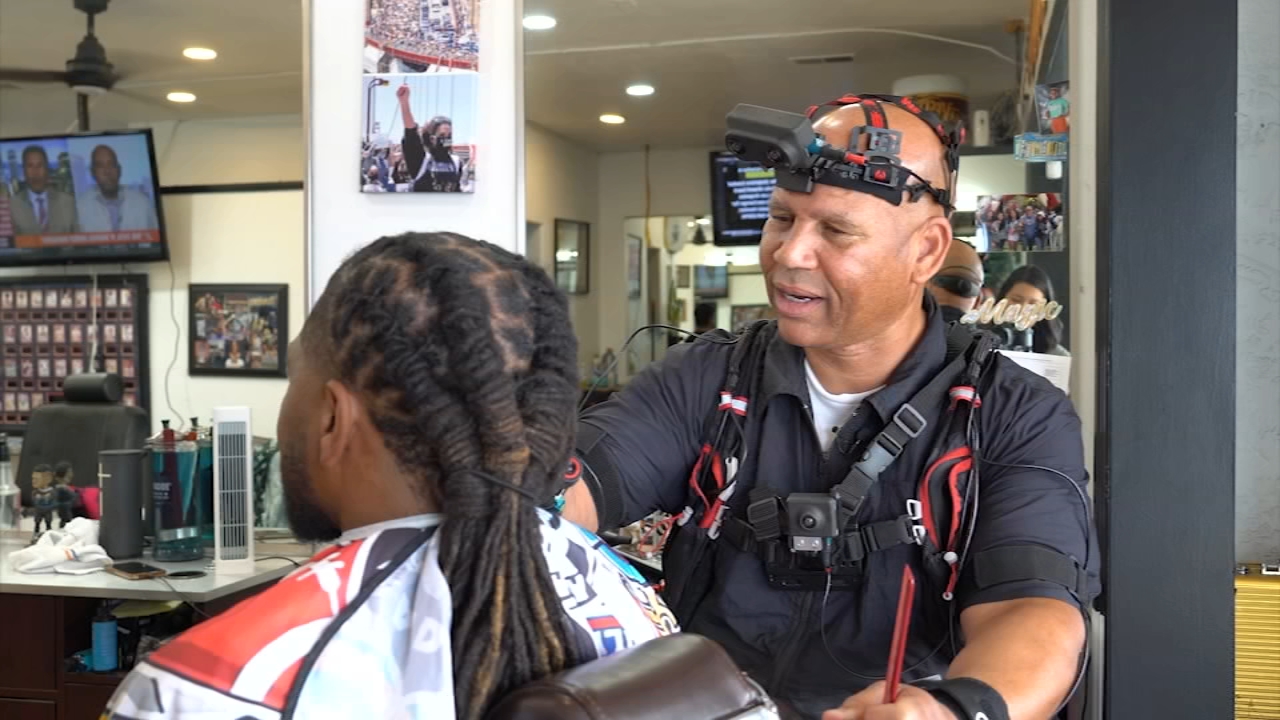 Source-feed image associated with Here's why an 'old school' San Jose barber is now teaching robots to cut hair with AI