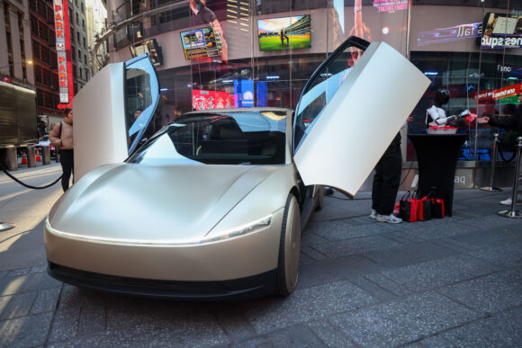 Source-feed image associated with Tesla Readies Cybercab Launch Event That’s Shrouded in Mystery