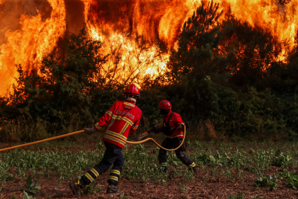 Source-feed image associated with Wildfires rage in Portugal, Greece and Spain while Greek authorities warn of toxic smoke