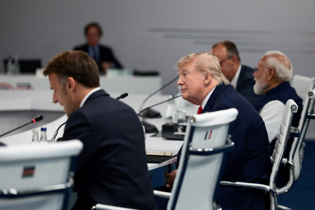 Source-feed image associated with Hot mics capture world leaders' chats between weighty topics at G7 summit