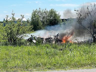 Source-feed image associated with 12 dead in crash of plane on skydiving outing in Missouri, authorities say