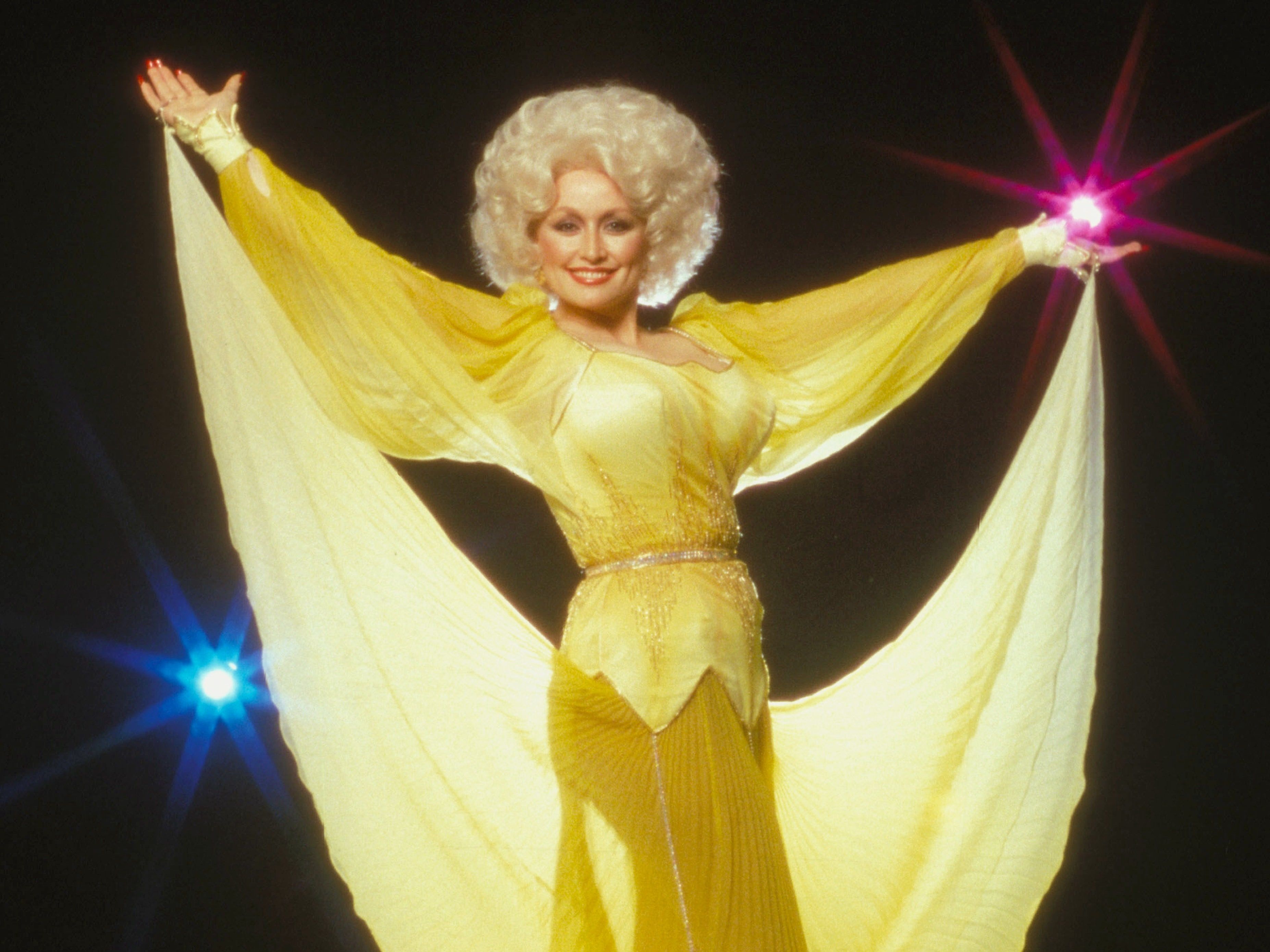 Source-feed image associated with “She Doesn’t Follow Trends”; Dolly Parton’s Longtime Stylist on Her One-of-a-Kind Style