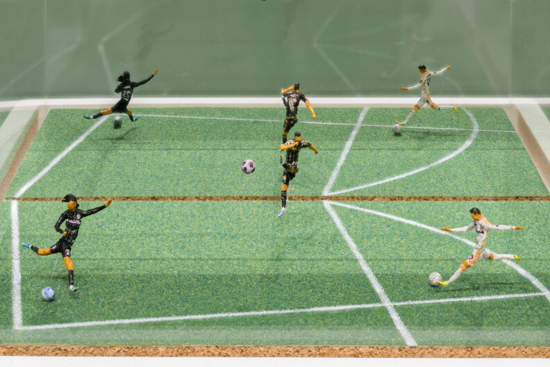Source-feed image associated with He's been making 1-inch soccer players out of gum wrappers since age 10 — see them at LACMA