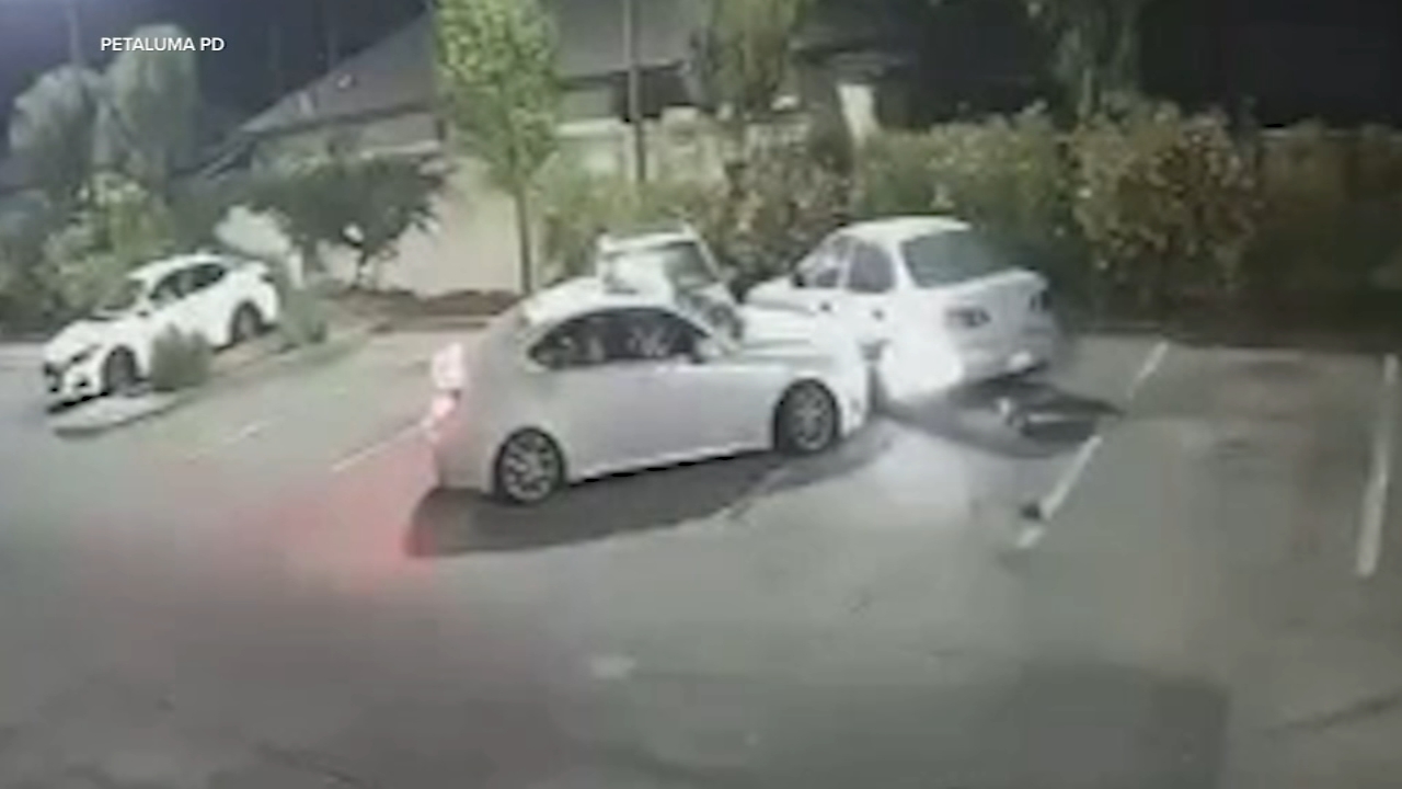 Source-feed image associated with Security video shows hit-and-run crash at Petaluma Taco Bell; police searching for white Infiniti