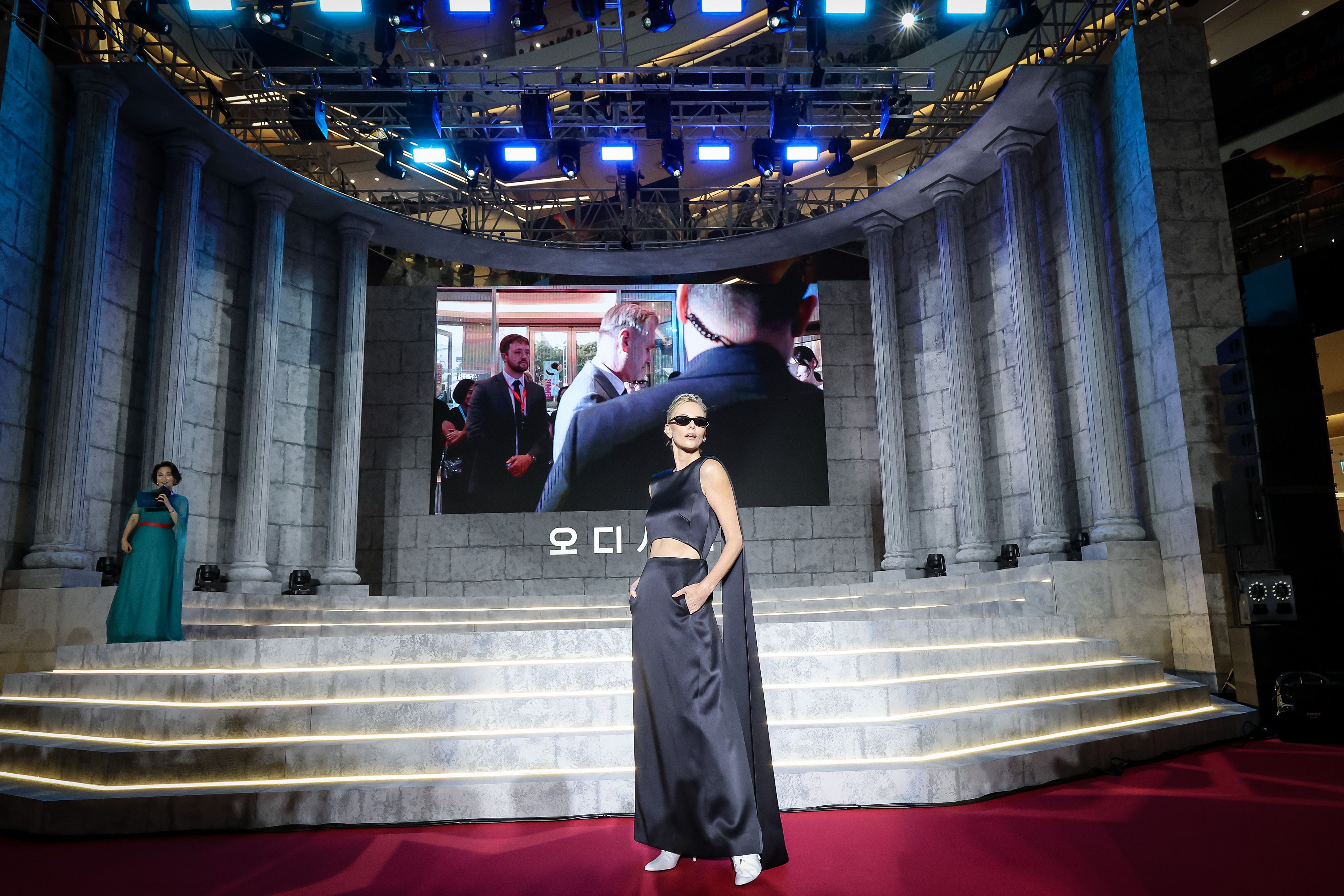 Source-feed image associated with Charlize Theron’s Fashion Odyssey Isn’t Over Yet!
