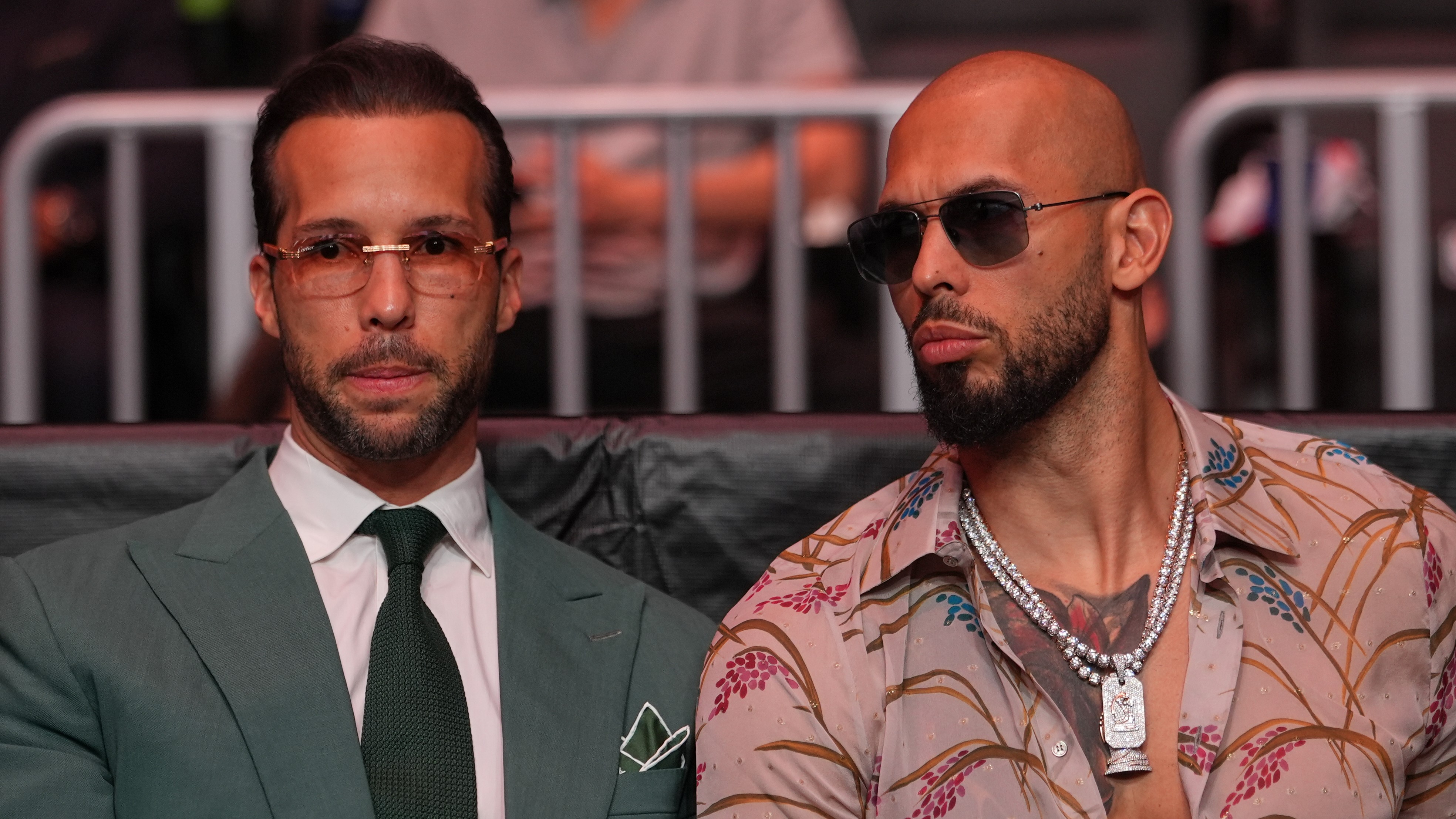 Source-feed image associated with Social media influencers Andrew and Tristan Tate arrested in Miami, US Marshals Service says