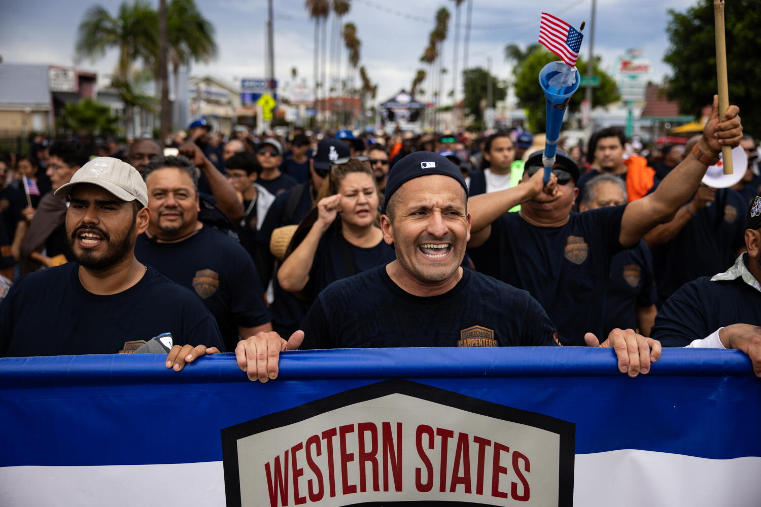 Source-feed image associated with Union workers at Labor Day rally sound alarm over automation, job losses, affordability