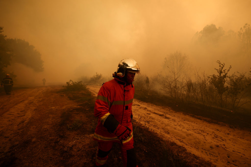 Source-feed image associated with More than 200,000 people flee raging wildfires in France and Spain, some escaping by boat