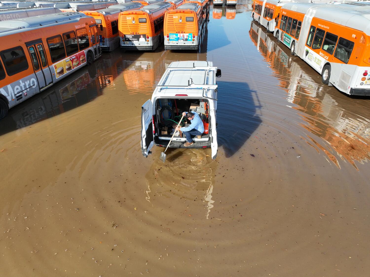 Source-feed image associated with Sunset Strip flooded by ruptured 110-year-old water line, another blow to L.A.'s ancient infrastructure