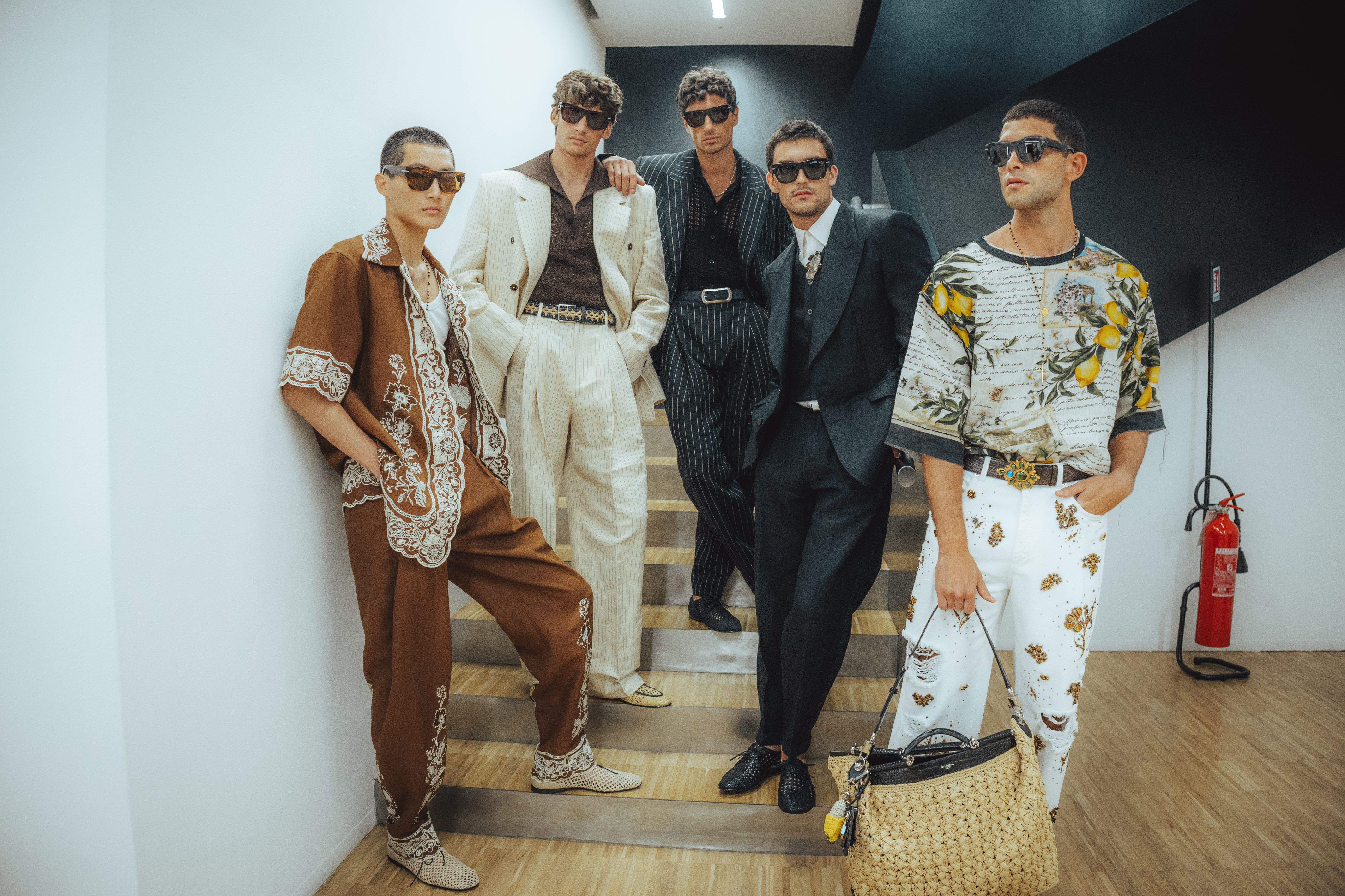 Source-feed image associated with The Best Backstage Photos From Dolce & Gabbana, Thom Browne, and Giorgio Armani at the Spring 2027 Menswear Shows