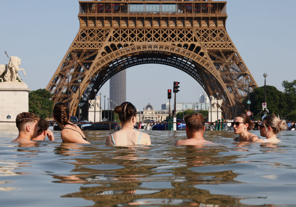 Source-feed image associated with Europe swelters under an early heat wave as France records 40 drowning deaths