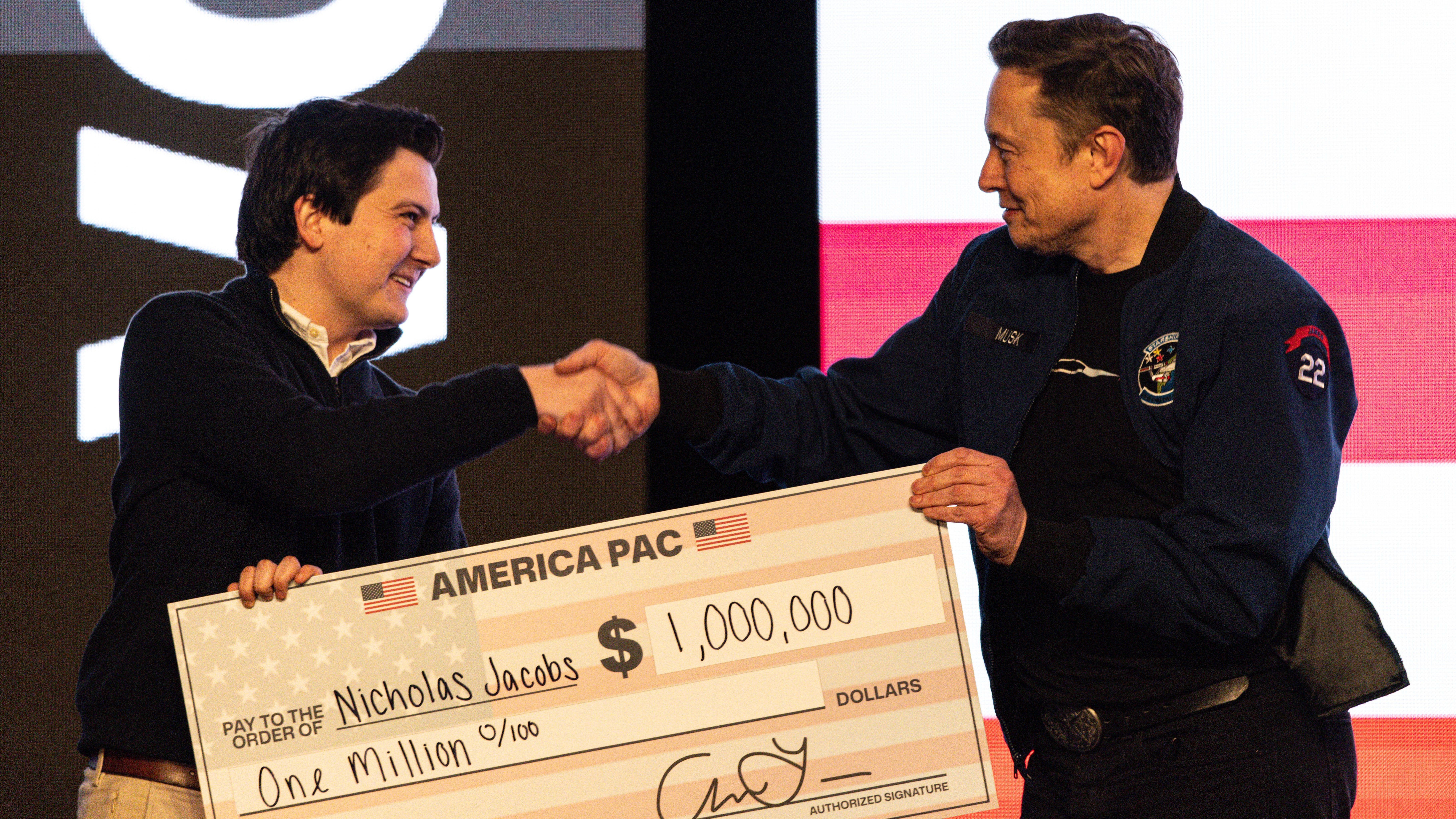 Source-feed image associated with Elon Musk likely broke the law by promising voters $1 million payouts, Wisconsin board says
