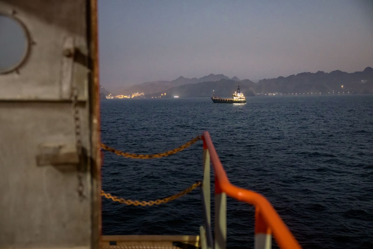 Source-feed image associated with Iran’s ship attack tests the shipping-insurance market just as war-risk premiums had plunged