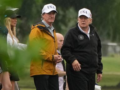 Source-feed image associated with Trump says his renovation plans for a golf course will have Washington hosting a 'major' tournament