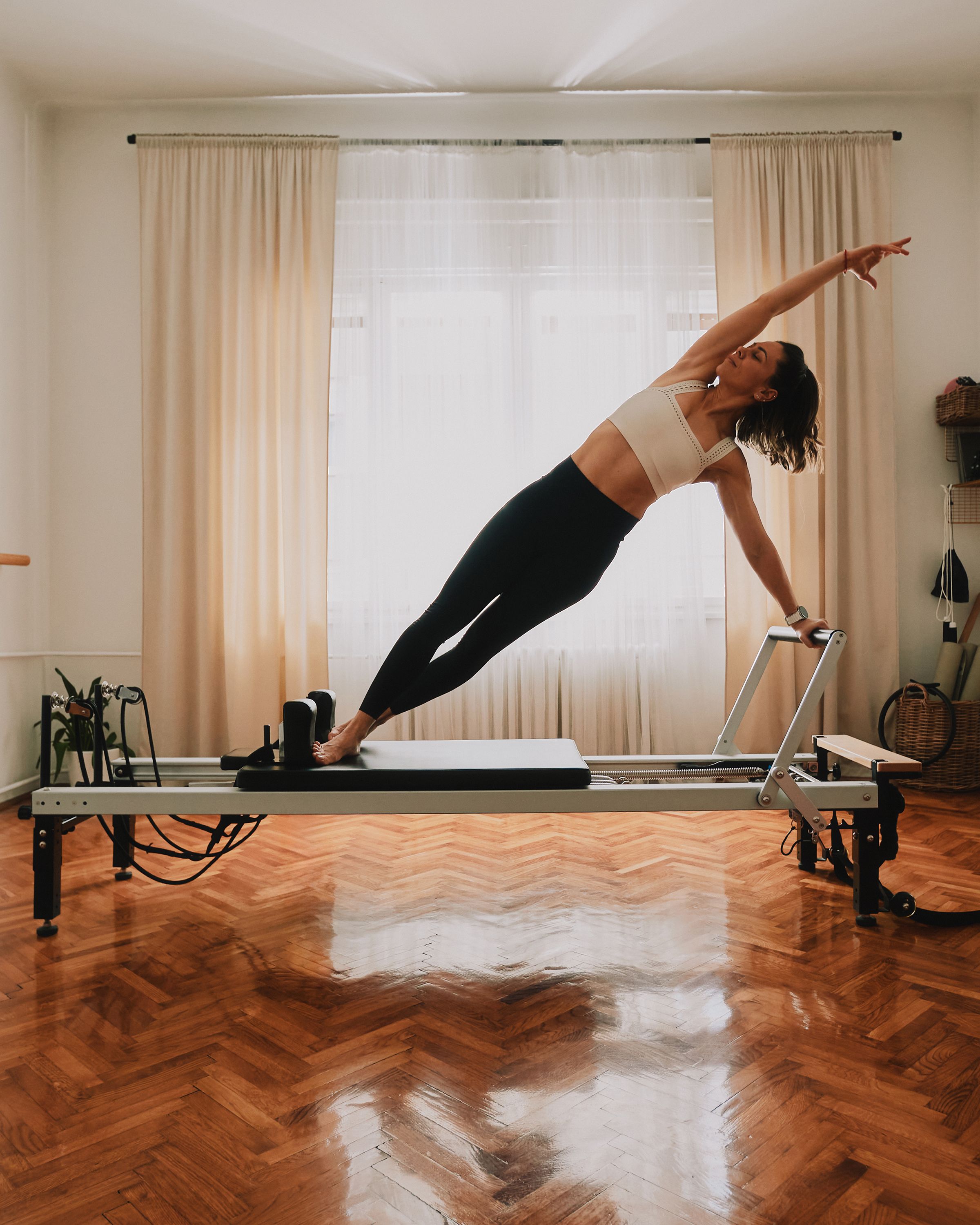 Source-feed image associated with I Tested an At-Home Pilates Reformer for Months—Was It Worth It?