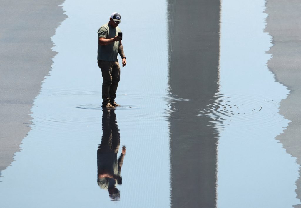Source-feed image associated with Trump says Reflecting Pool work is done and it's set to be filled with water